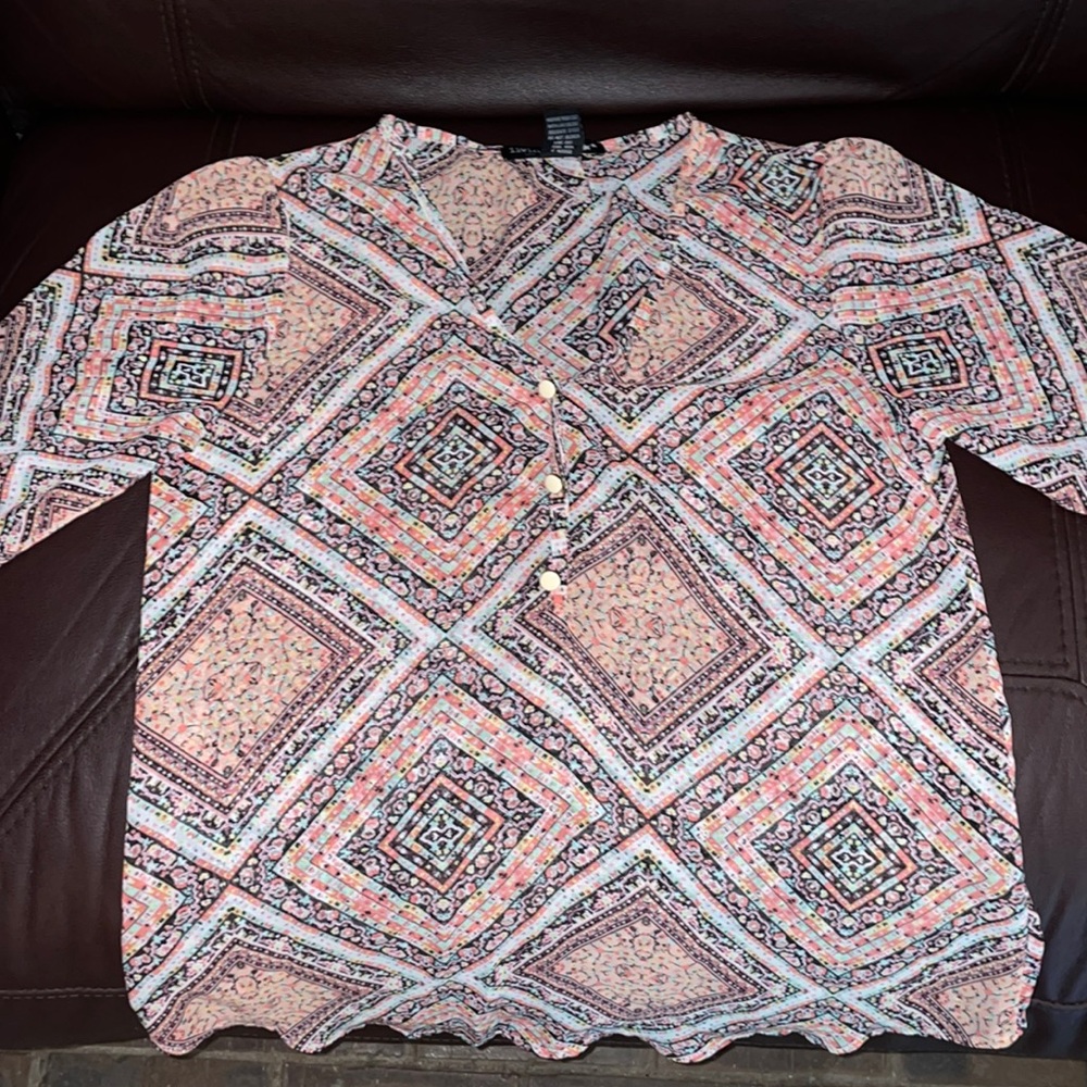 Thin XS multicolored short sleeve shirt. Super breathable and comfy.